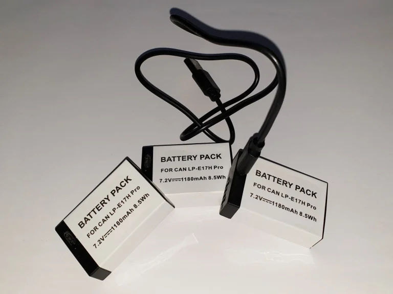Picture 4: Three Canon LP-E17H Pro camera batteries with USB-A/USB-C cable